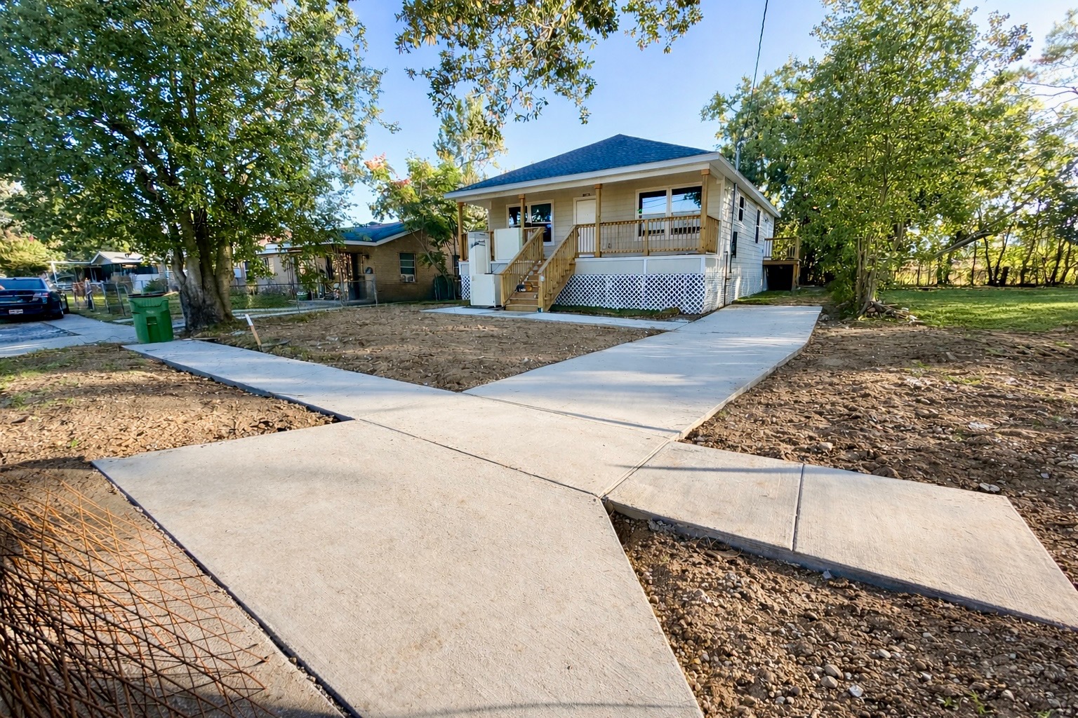 Freshly poured concrete walkways around a home